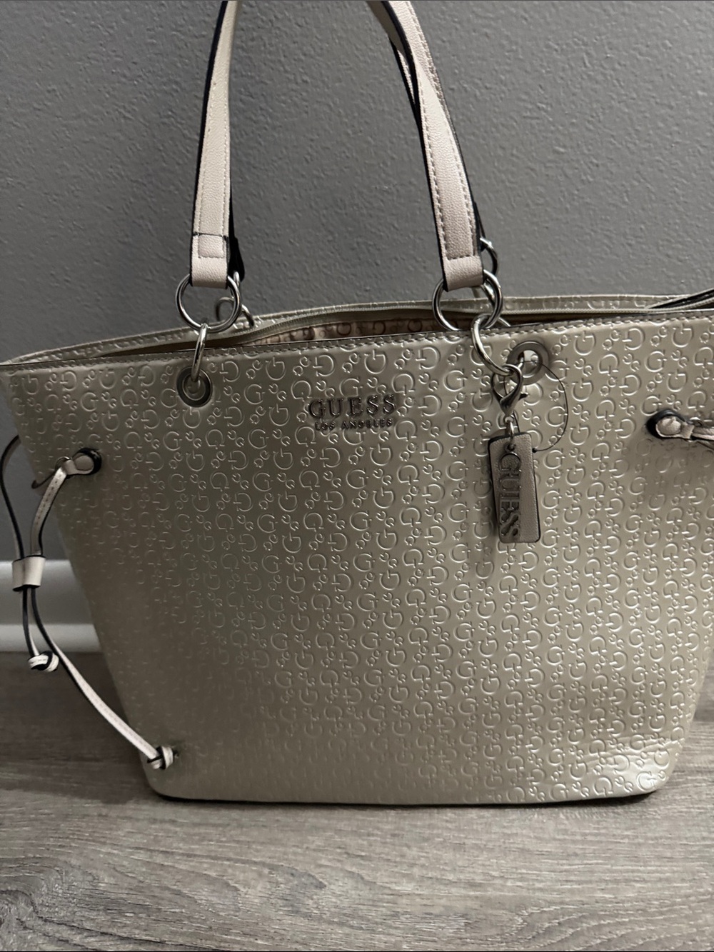 GUESS Metallic Taupe Embossed Logo Tote with Charm